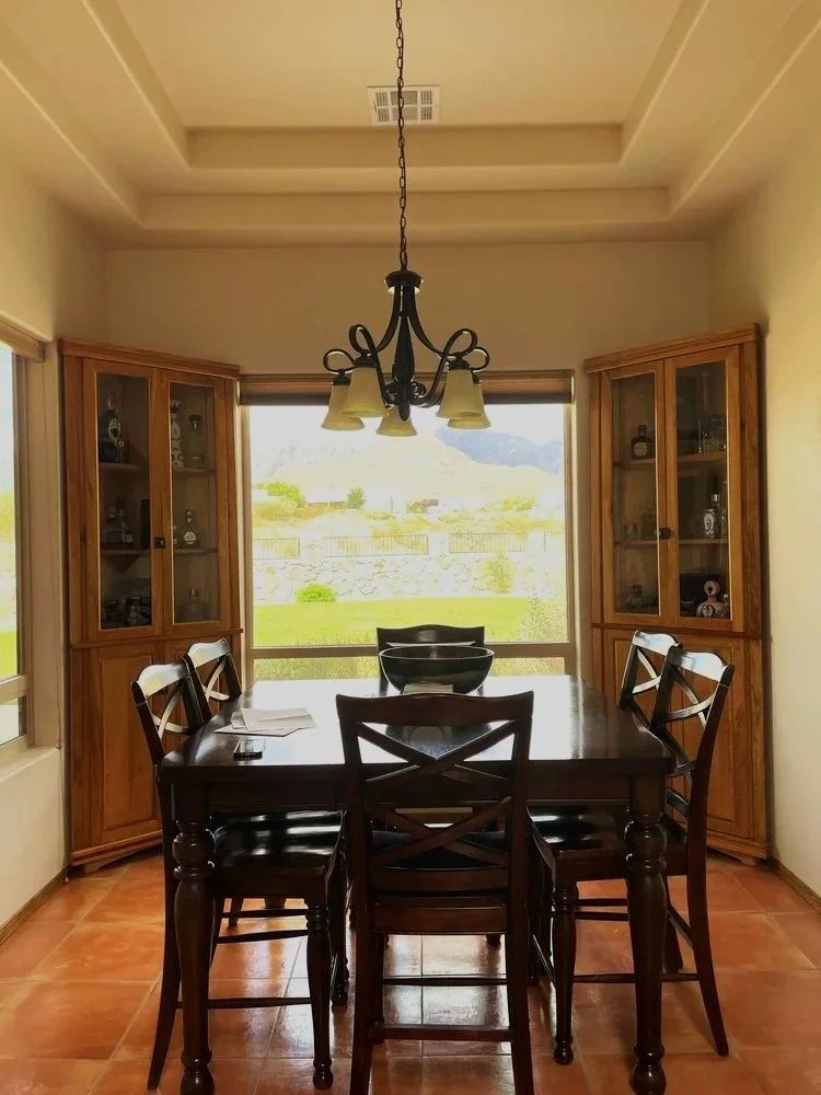 Cypress corner cabinets installed in a dining room