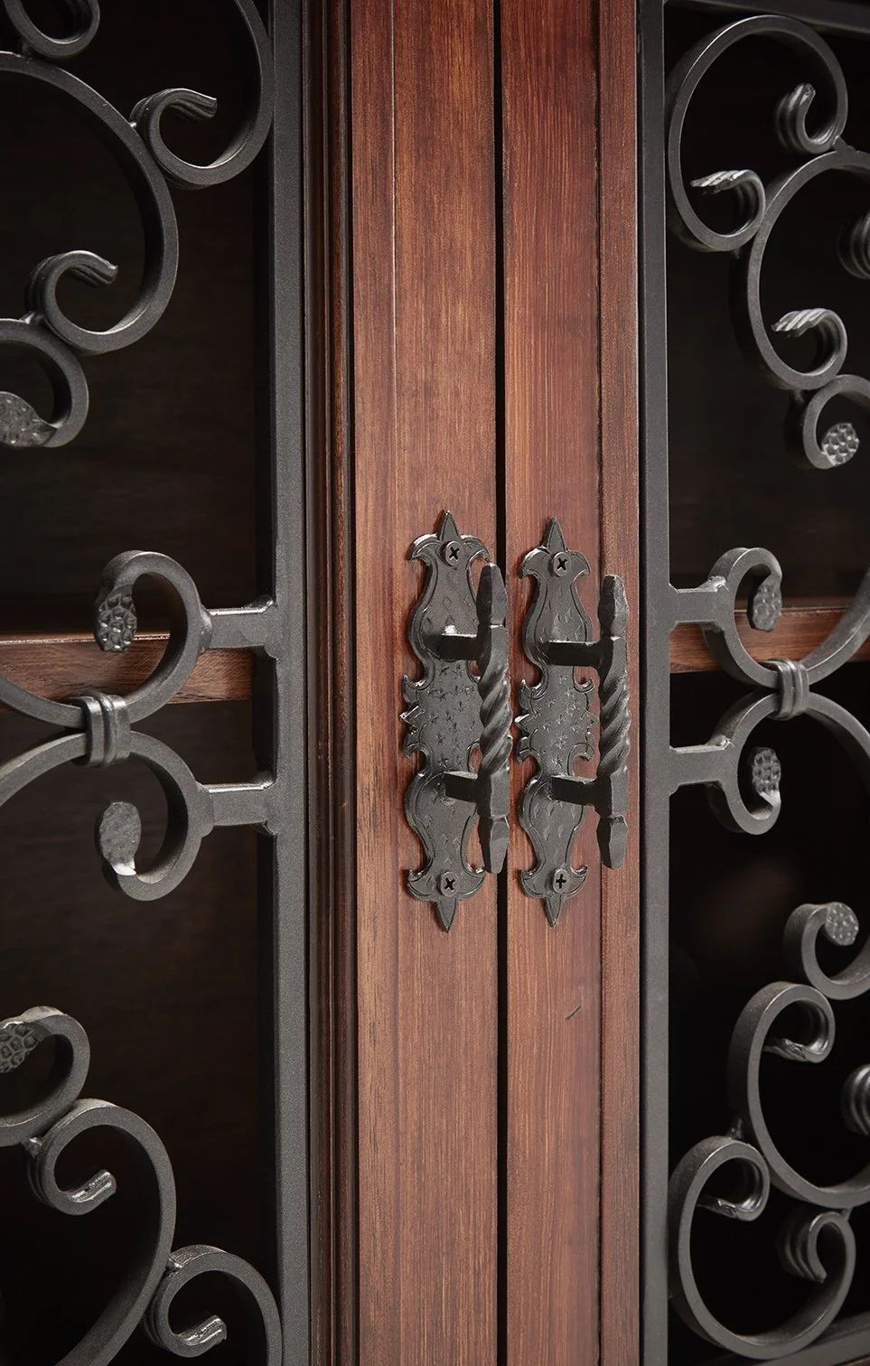 Custom ironwork and hardware on the console doors