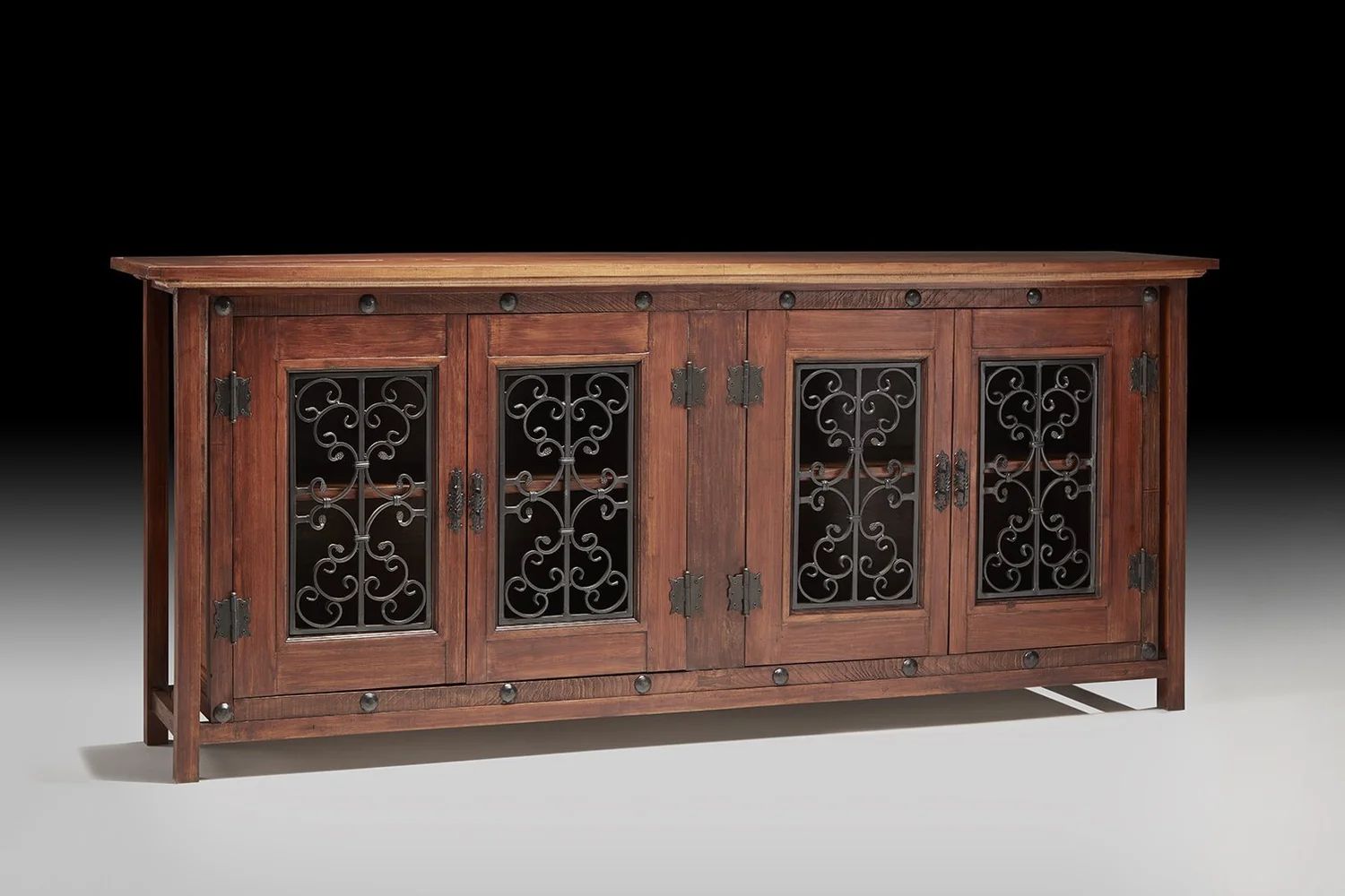 Red oak New Mexico Revival console with four iron-grille doors