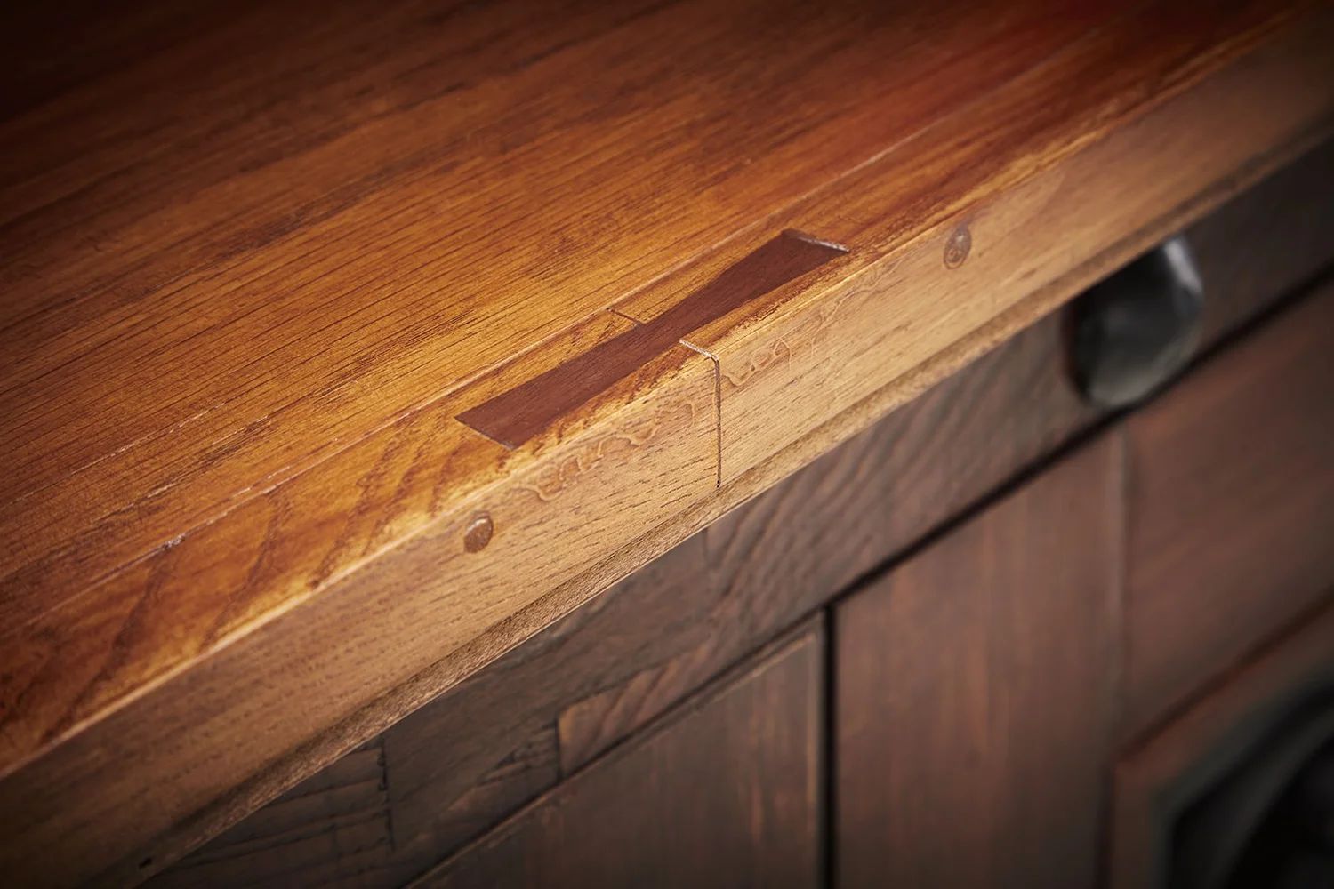 Joinery detail on the red oak top