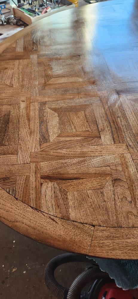 Close view of the parquet pecan top